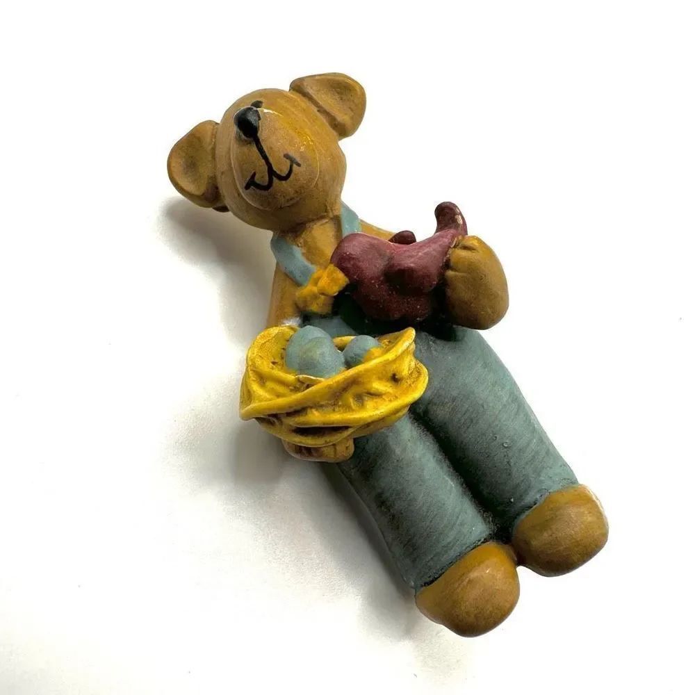 Bear holding bird and eggs farmer brooch